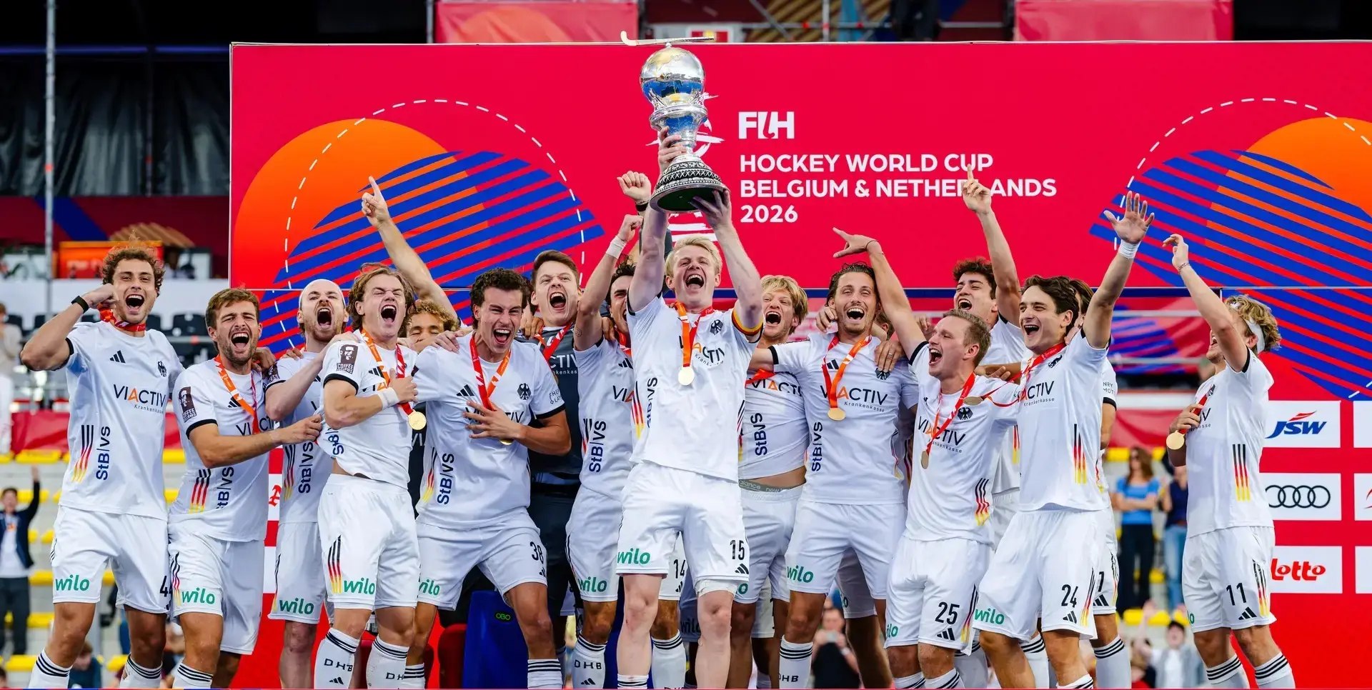Germany's men's hockey team lifting the 2026 FIH World Cup trophy